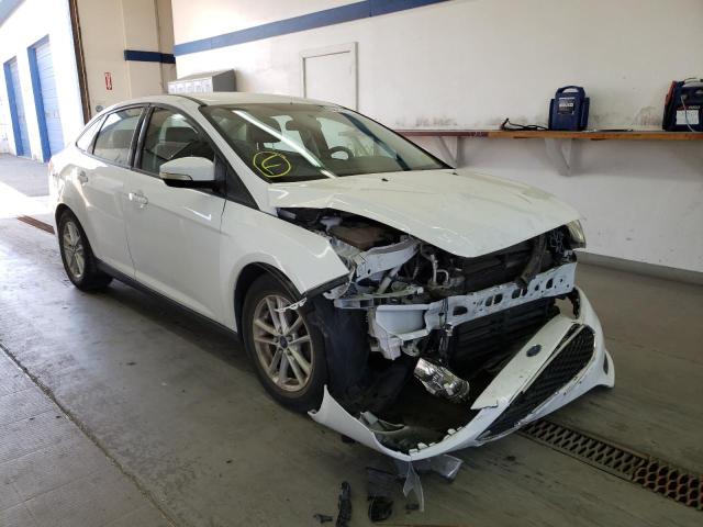 FORD FOCUS SE 2015 with VIN 1FADP3F2XFL386379 - Photo from auction