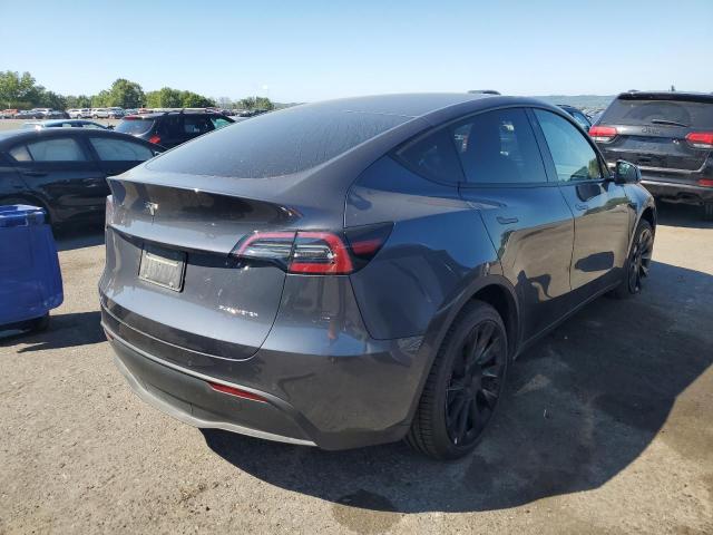 Photo 4 from auction – 2022 TESLA MODEL Y with VIN 7SAYGDEE2NF386359