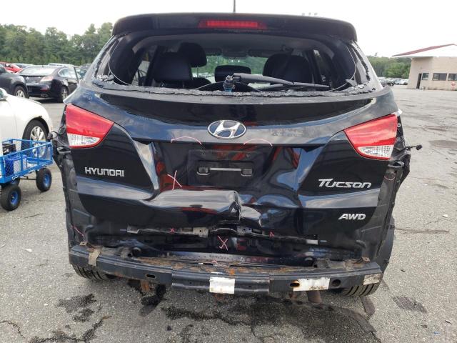Photo 9 from auction – 2012 HYUNDAI TUCSON GLS with VIN KM8JUCAC2CU336003