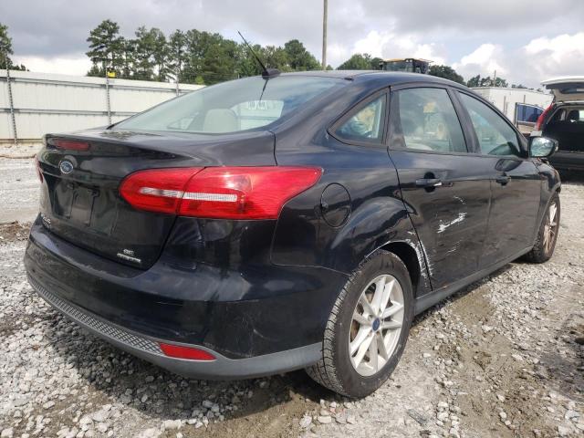 Photo 4 from auction – 2015 FORD FOCUS SE with VIN 1FADP3F24FL365365