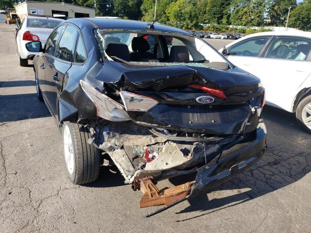 Photo 9 from auction – 2014 FORD FOCUS with VIN 1FADP3F20EL215350