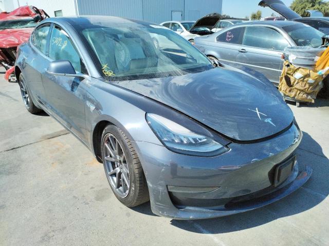 TESLA MODEL 3 2018 with VIN 5YJ3E1EB4JF181587 - Photo from auction