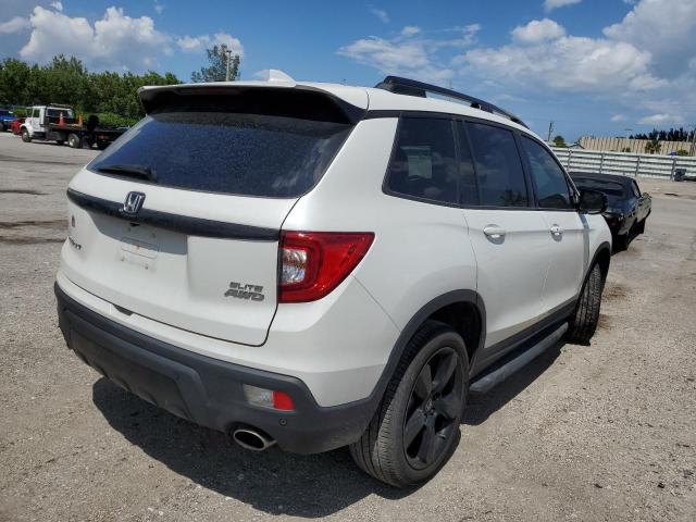 Photo 4 from auction – 2021 HONDA PASSPORT E with VIN 5FNYF8H03MB021999