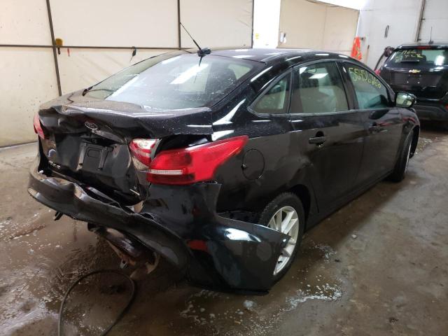 Photo 4 from auction – 2016 FORD FOCUS SE with VIN 1FADP3F23GL382983
