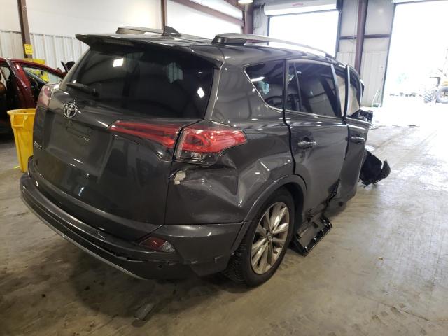 Photo 4 from auction – 2018 TOYOTA RAV4 LIMIT with VIN 2T3YFREV6JW453935