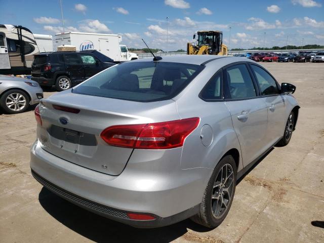 Photo 4 from auction – 2018 FORD FOCUS SE with VIN 1FADP3F23JL320247