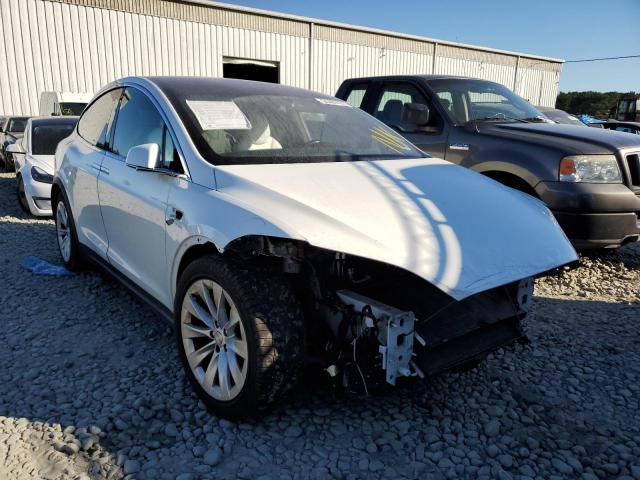 TESLA MODEL X 2017 with VIN 5YJXCBE27HF076209 - Photo from auction