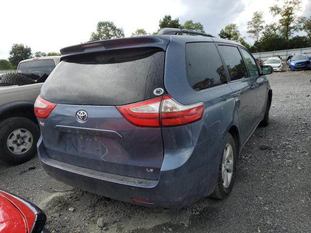 Photo 4 from auction – 2015 TOYOTA SIENNA LE with VIN 5TDKK3DCXFS608574