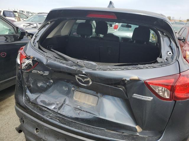 Photo 9 from auction – 2013 MAZDA CX-5 TOURI with VIN JM3KE2CE7D0131078