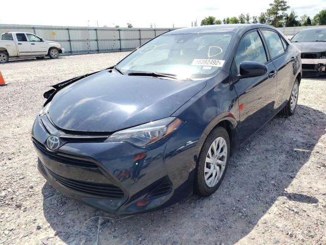 Photo 2 from auction – 2018 TOYOTA COROLLA L with VIN 5YFBURHE0JP812312