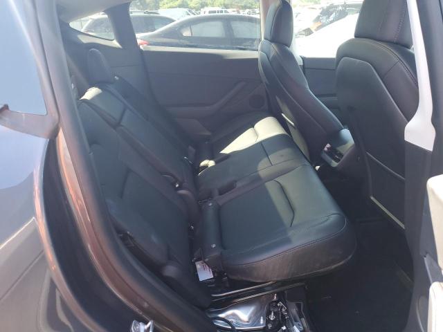 Photo 6 from auction – 2022 TESLA MODEL Y with VIN 7SAYGDEE2NF386359