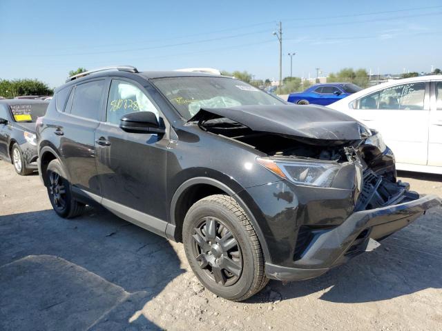 TOYOTA RAV4 LE 2017 with VIN 2T3BFREV8HW631036 - Photo from auction
