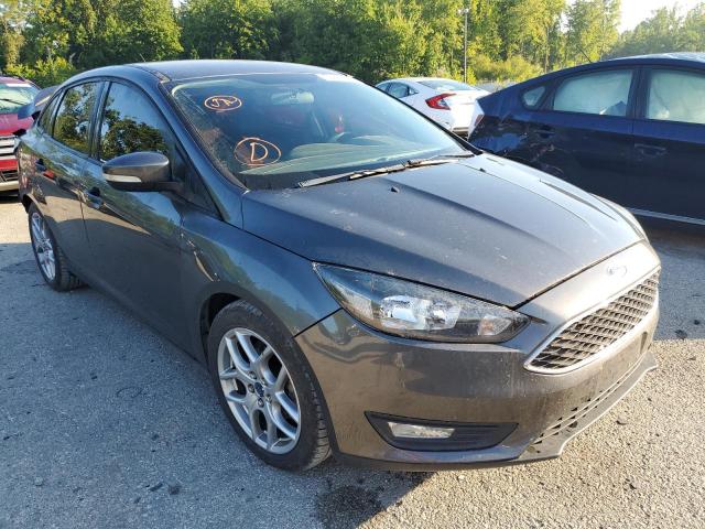 FORD FOCUS SE 2015 with VIN 1FADP3F29FL319353 - Photo from auction