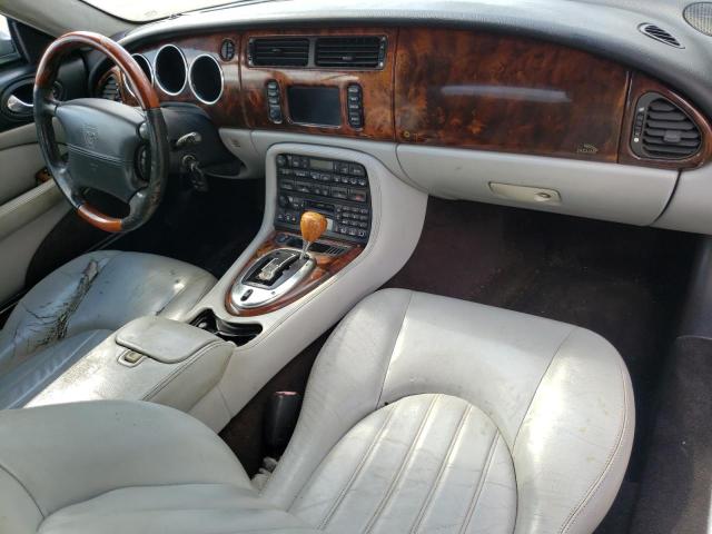 Photo 9 from auction – 2004 JAGUAR XK8 with VIN SAJDA42C742A39518
