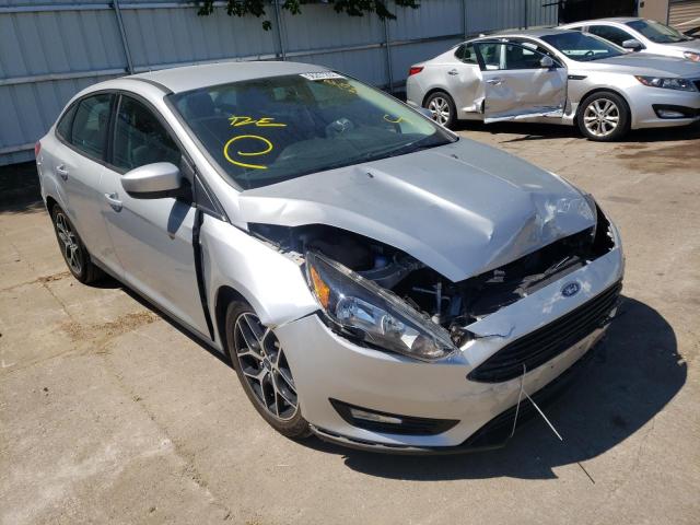 FORD FOCUS SE 2018 with VIN 1FADP3F23JL320247 - Photo from auction