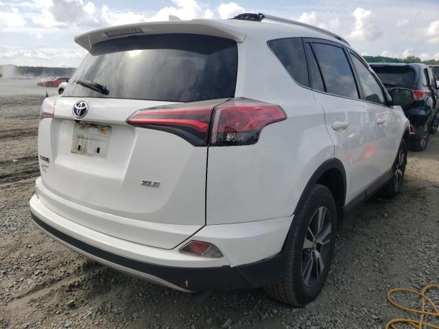 Photo 4 from auction – 2017 TOYOTA RAV4 XLE with VIN JTMWFREV3HJ113576