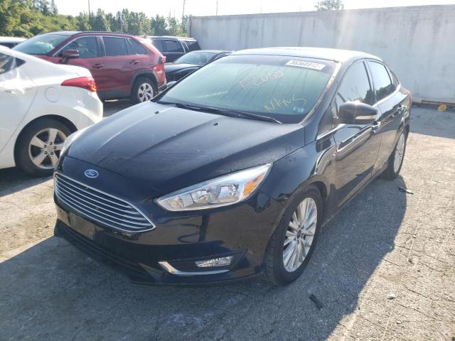 Photo 2 from auction – 2016 FORD FOCUS TITA with VIN 1FADP3J27GL361464