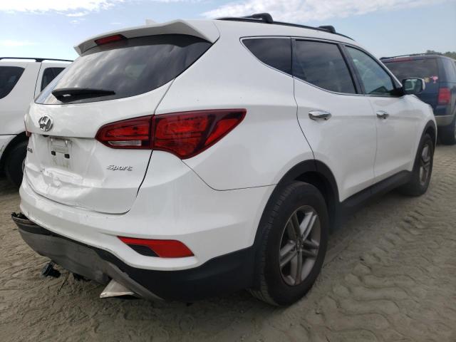 Photo 4 from auction – 2018 HYUNDAI SANTA FE S with VIN 5NMZU3LB5JH085106