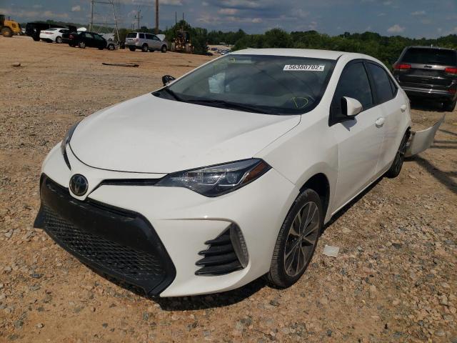 Photo 2 from auction – 2018 TOYOTA COROLLA L with VIN 5YFBURHE0JP831569