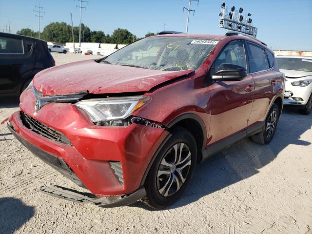 Photo 2 from auction – 2016 TOYOTA RAV4 LE with VIN JTMZFREV5GJ092922