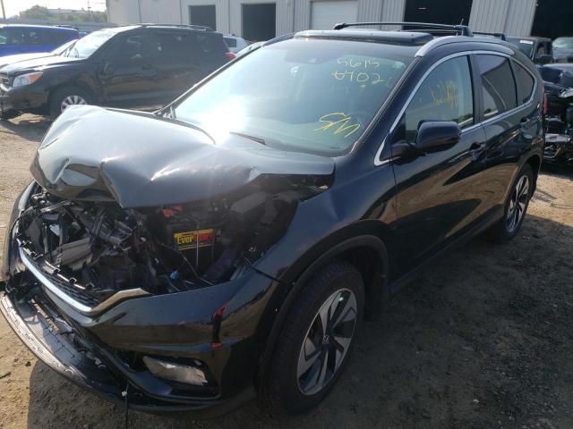 Photo 2 from auction – 2016 HONDA CR-V TOURI with VIN 5J6RM3H97GL007384