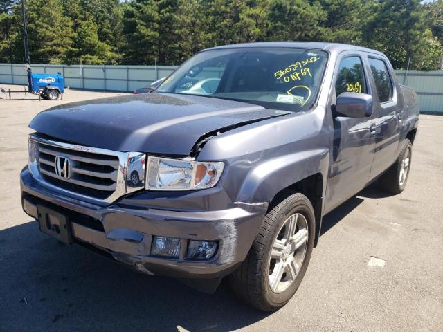 Photo 2 from auction – 2014 HONDA RIDGELINE with VIN 5FPYK1F5XEB011769