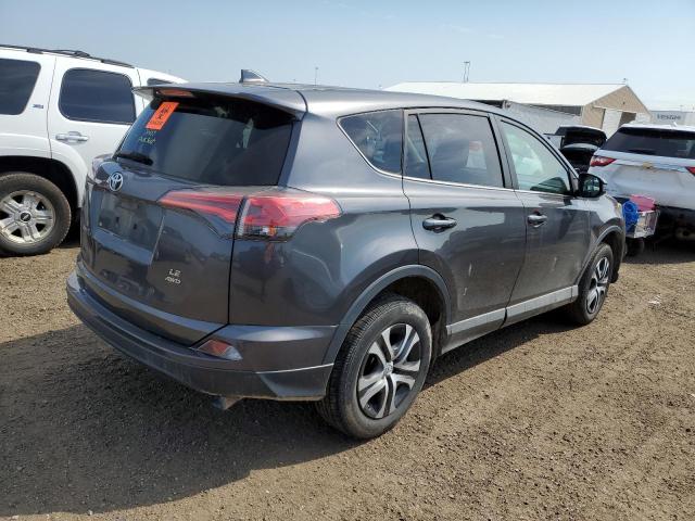 Photo 4 from auction – 2018 TOYOTA RAV4 LE with VIN 2T3BFREV7JW765610