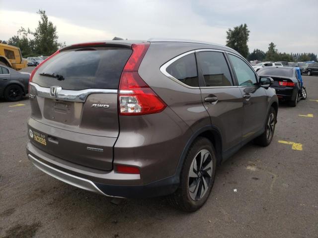 Photo 4 from auction – 2016 HONDA CR-V TOURI with VIN 5J6RM4H97GL012669
