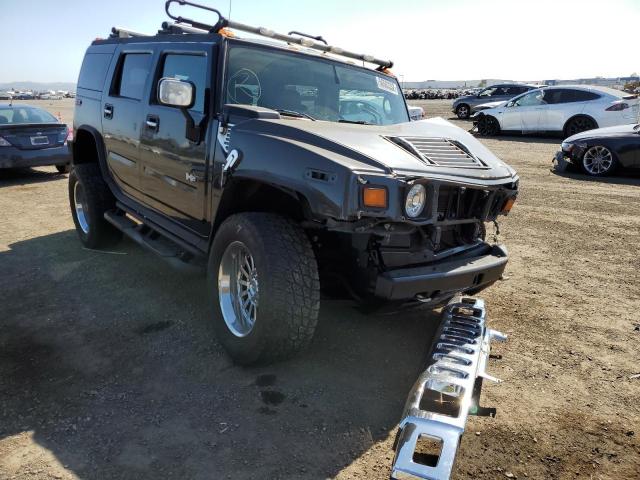 HUMMER H2 2004 with VIN 5GRGN23U44H116897 - Photo from auction