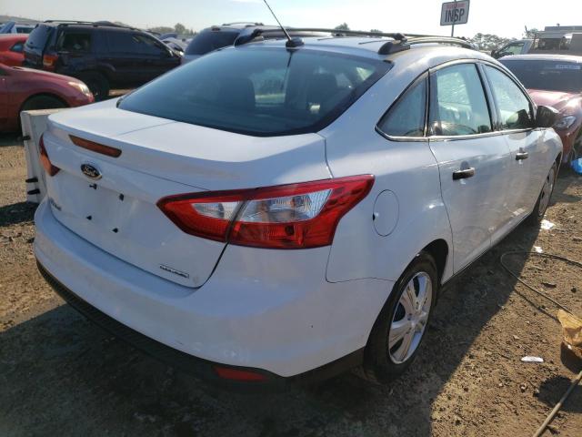 Photo 4 from auction – 2013 FORD FOCUS S with VIN 1FADP3E24DL161339