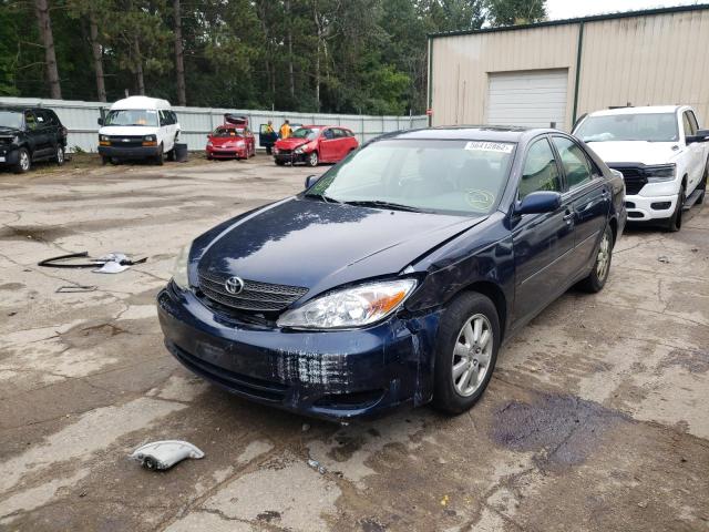 Photo 2 from auction – 2004 TOYOTA CAMRY LE with VIN 4T1BF30K74U062905