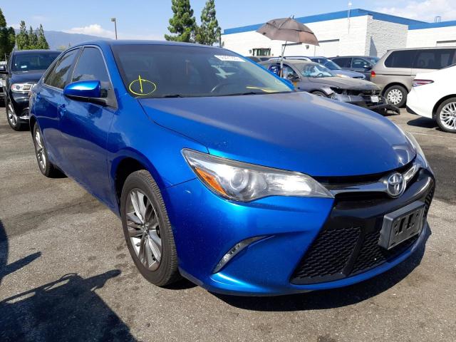 TOYOTA CAMRY LE 2017 with VIN 4T1BF1FK7HU797661 - Photo from auction
