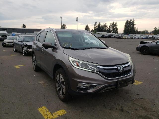 HONDA CR-V TOURI 2016 with VIN 5J6RM4H97GL012669 - Photo from auction