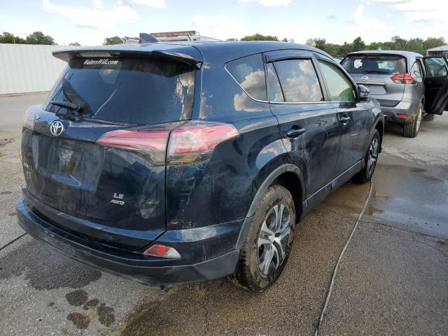 Photo 4 from auction – 2017 TOYOTA RAV4 LE with VIN JTMBFREV5HJ165693