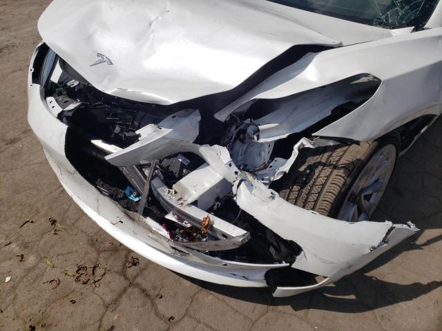 Photo 9 from auction – 2022 TESLA MODEL 3 with VIN 5YJ3E1EB8NF192484