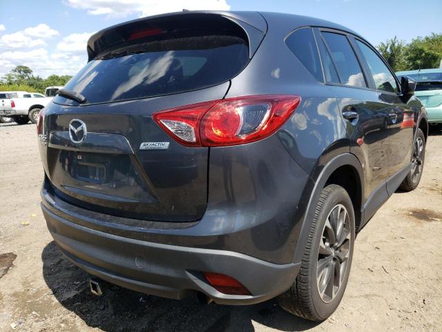 Photo 4 from auction – 2016 MAZDA CX-5 GT with VIN JM3KE4DYXG0890803