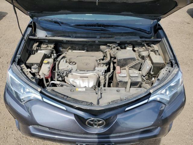 Photo 7 from auction – 2018 TOYOTA RAV4 LE with VIN 2T3BFREV7JW765610