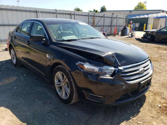 FORD TAURUS SEL 2015 with VIN 1FAHP2E85FG169414 - Photo from auction