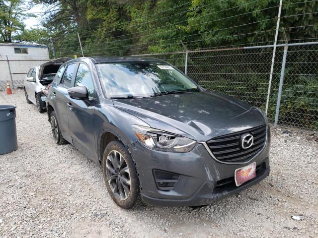 MAZDA CX-5 GT 2016 with VIN JM3KE4DY3G0800228 - Photo from auction