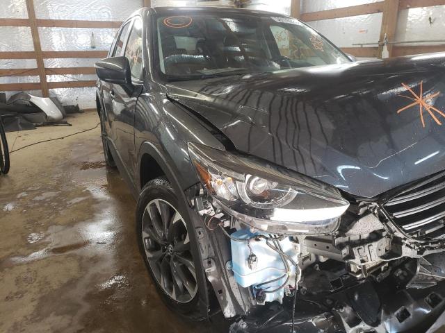 MAZDA CX-5 GT 2016 with VIN JM3KE4DY5G0808556 - Photo from auction