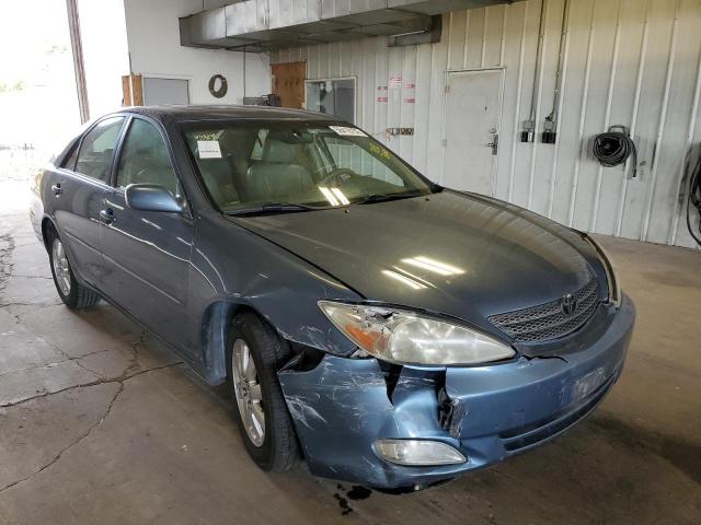 TOYOTA CAMRY 2003 with VIN JTDBF30K230111017 - Photo from auction