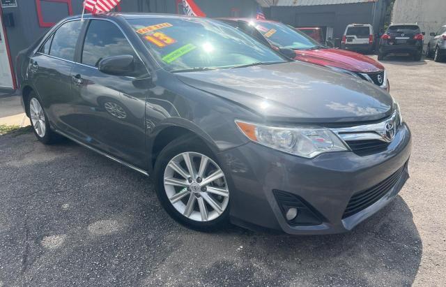 TOYOTA CAMRY L 2013 with VIN 4T1BF1FK4DU673020 - Photo from auction