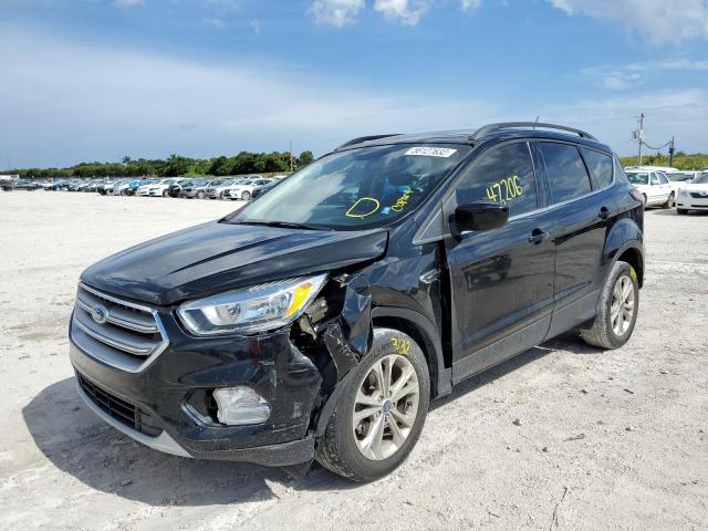 Photo 2 from auction – 2018 FORD ESCAPE SE with VIN 1FMCU0GD9JUA21249