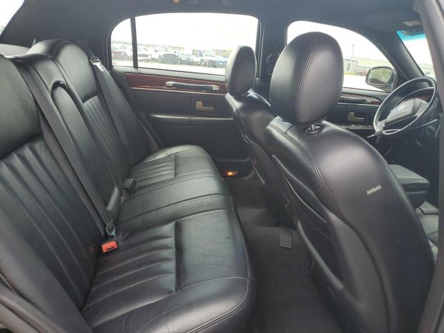 Photo 6 from auction – 2004 LINCOLN TOWN CAR E with VIN 1LNHM81WX4Y637117