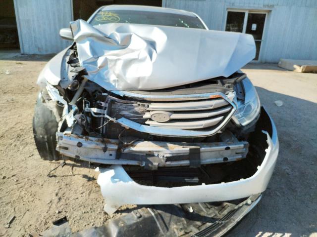 Photo 7 from auction – 2014 FORD TAURUS SEL with VIN 1FAHP2E86EG149803