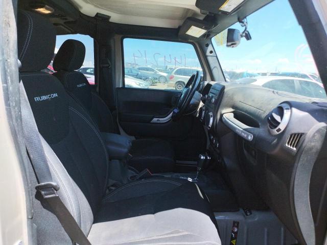 Photo 5 from auction – 2016 JEEP WRANGLER U with VIN 1C4BJWFG5GL261551