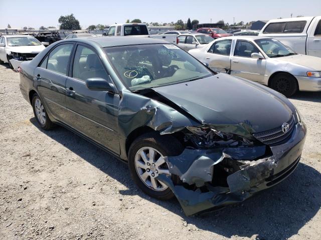 Photo 1 from auction – 2002 TOYOTA CAMRY LE with VIN JTDBF30K420003738
