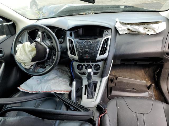 Photo 9 from auction – 2014 FORD FOCUS SE with VIN 1FADP3F25EL121934