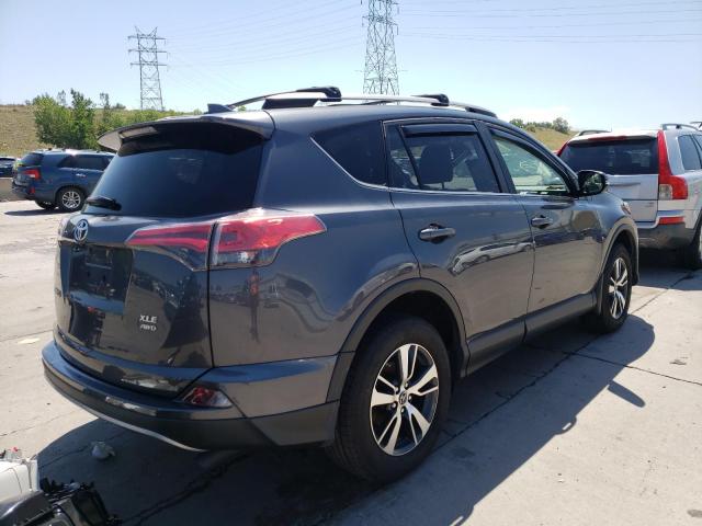 Photo 4 from auction – 2017 TOYOTA RAV4 XLE with VIN JTMRFREV7HD209836