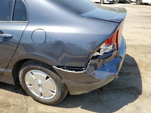 Photo 9 from auction – 2006 HONDA CIVIC HYBR with VIN JHMFA36256S014196